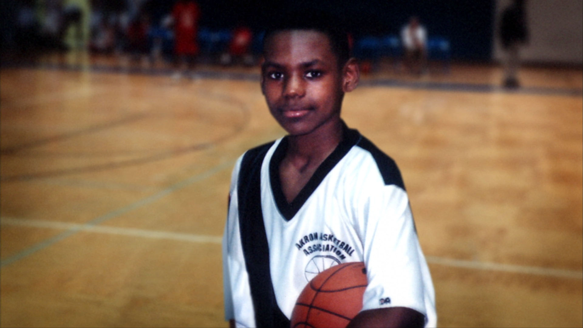 lebron james kid playing basketball